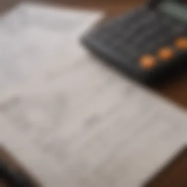 A close-up of loan documents and a calculator